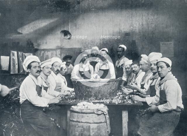 Some of the cooks preparing the soup at the Messagerie Van Gand, c1914. Artist: Unknown