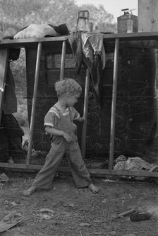 Son of destitute migrant, American River camp, near Sacramento, California, 1936. Creator: Dorothea Lange