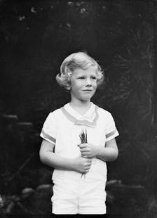 Son of W.G. Kimball, standing outdoors, between 1911 and 1942. Creator: Arnold Genthe