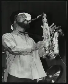 Sonny Rollins playing tenor saxophone at Wembley Conference Centre, London, 1979. Creator: Denis Williams