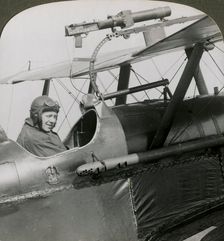 Sopwith Scout with photographic gun mounted on the upper wing, World War I, 1914-1918.Artist: Realistic Travels Publishers