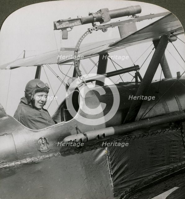 Sopwith Scout with photographic gun mounted on the upper wing, World War I, 1914-1918.Artist: Realistic Travels Publishers