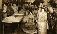 Sorting uniforms at the WAAC clothing store, First World War, 1914-1918, (1933). Creator: Unknown