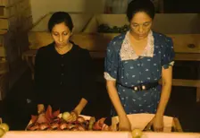 Sorting and packing tomatoes at the Yauco Cooperative Tomato Growers Association, Puerto Rico, 1942. Creator: Jack Delano