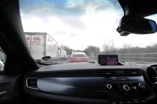 Satellite navigation system in Alfa Romeo Giulietta 2011 in heavy traffic