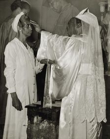 Saturday afternoon, 7th Street and Florida Avenue, N.W., Washington, D.C., 1942. Creator: Gordon Parks