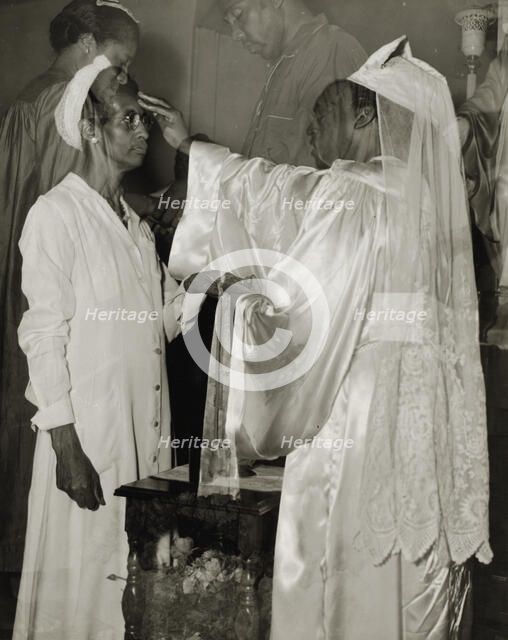 Saturday afternoon, 7th Street and Florida Avenue, N.W., Washington, D.C., 1942. Creator: Gordon Parks.