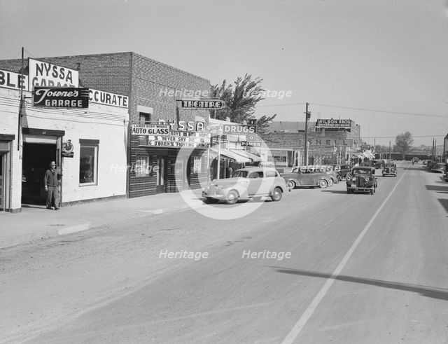 Saturday afternoon, main street of Nyssa, Oregon, 1939. Creator: Dorothea Lange.