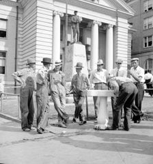 Saturday afternoon in front of the courthouse, Greenville [i.e., Greeneville], Tennessee, 1936. Creator: Dorothea Lange