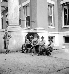 Saturday afternoon in front of the courthouse, Greenville [i.e., Greeneville], Tennessee, 1936. Creator: Dorothea Lange