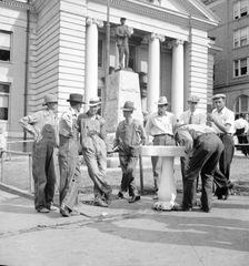 Saturday afternoon in front of the courthouse, Greenville [i.e., Greeneville], Tennessee, 1936. Creator: Dorothea Lange