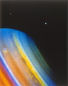 Saturn and its moon Dione, seen from the Voyager 2 spacecraft. Creator: NASA