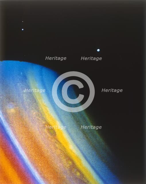 Saturn and its moon Dione, seen from the Voyager 2 spacecraft. Creator: NASA.