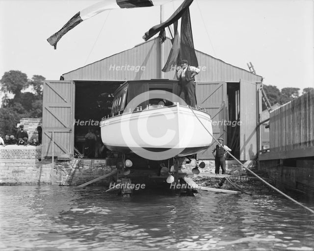 Saunders' motor launch on slipway ready for launching, 1908. Creator: Kirk & Sons of Cowes.