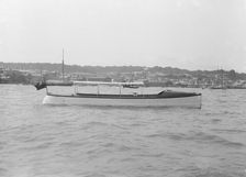 Saunders motor launch at anchor, 1914. Creator: Kirk & Sons of Cowes