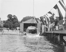 Saunders motor launch being launched, 1908. Creator: Kirk & Sons of Cowes
