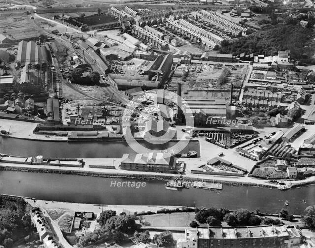 Sawmills and engineering works at the canal basin, Exeter, Devon, 1928. Artist: Aerofilms.