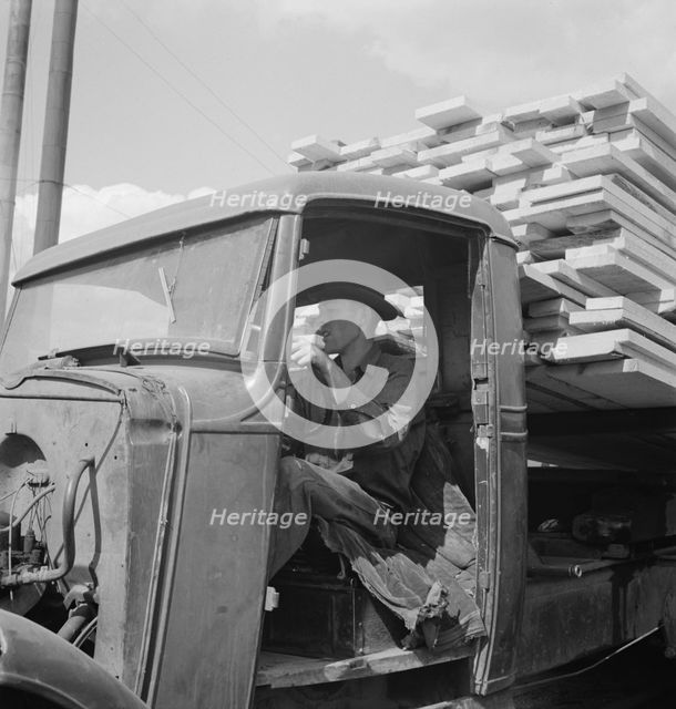 Sawn lumber leaving the mill by truck, Keno, Klamath County, Oregon, 1939. Creator: Dorothea Lange.