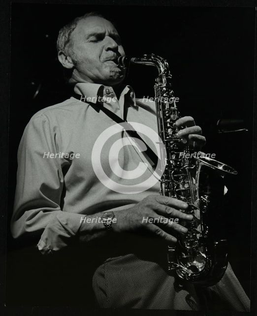 Saxophonist Bruce Turner playing at The Stables, Wavendon, Buckinghamshire. Artist: Denis Williams