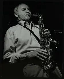 Saxophonist Bruce Turner playing at The Stables, Wavendon, Buckinghamshire. Creator: Denis Williams