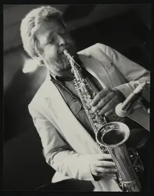 Saxophonist Geoff Simkins playing at The Fairway, Welwyn Garden City, Hertfordshire, 28 April 1991. Creator: Denis Williams
