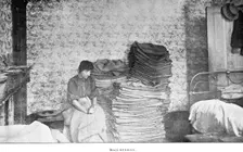 Sack mending from home, London, 1906. Creator: Unknown