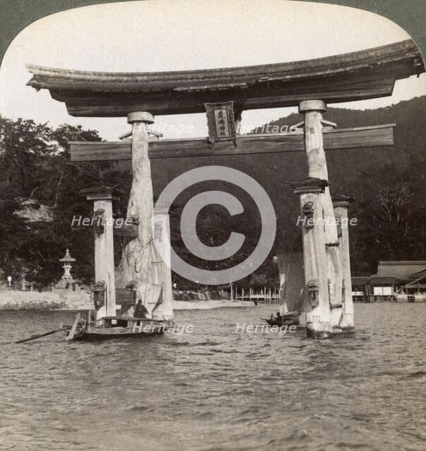 Sacred torii gate rising from the sea, Itsukushima Shrine, Miyajima Island, Japan, 1904. Artist: Underwood & Underwood