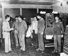 Saddam Hussein visiting a state paper press, Baghdad, Iraq, 1986