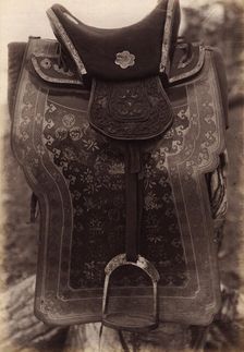 Saddle with Chinese Saddle-Cloth and Silver Mongolia Engraving over Iron, 1897. Creator: Unknown
