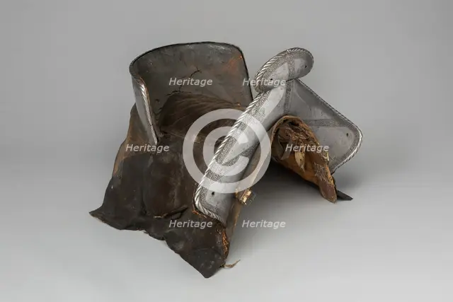 Saddle with Four Saddle Plates, Southern Germany, c. 1540. Creator: Unknown.