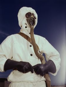 Sailor at the Naval Air Base wears the new type protective clothing...Corpus Christi, Texas, 1942. Creator: Howard Hollem