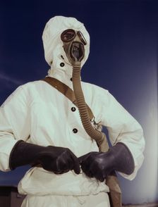 Sailor at the Naval Air Base wears the new type protective clothing...Corpus Christi, Texas, 1942. Creator: Howard Hollem