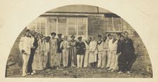 Sailors with men in drag outside a building, [between 1910 and 1919?]. Creator: Unknown