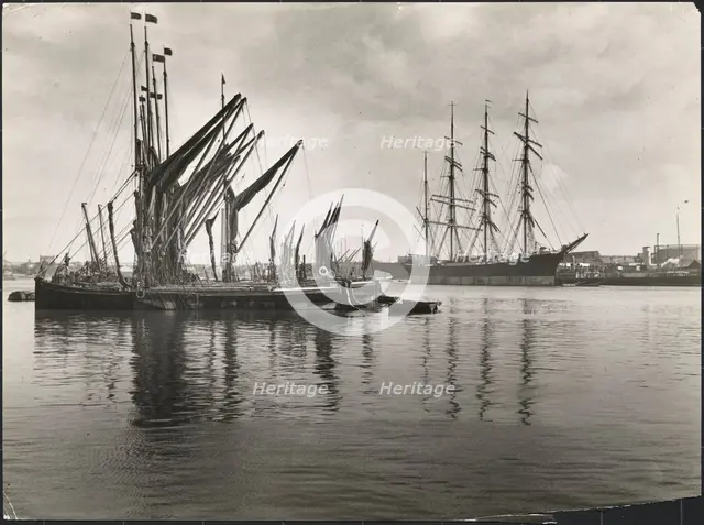 Sailing vessels at anchor on the River Medway below Rochester Bridge, Rochester, Medway, 1925-1935. Creator: J Dixon Scott.