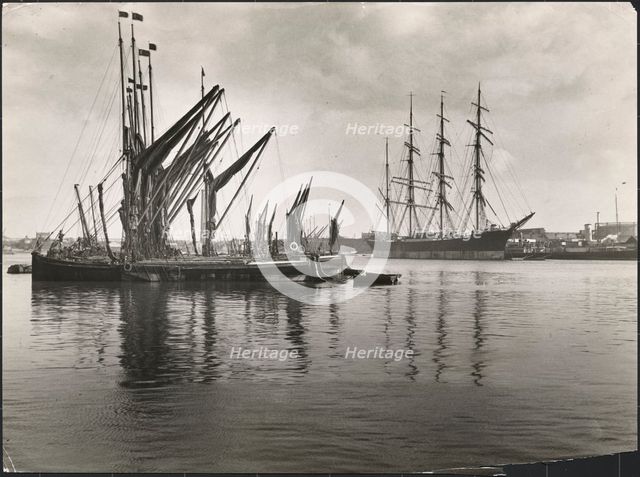 Sailing vessels at anchor on the River Medway below Rochester Bridge, Rochester, Medway, 1925-1935. Creator: J Dixon Scott.
