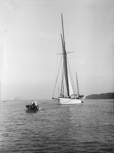 Sailing yacht Bona being towed, 1912. Creator: Kirk & Sons of Cowes