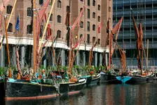 Sailing barges in St Katherine's Dock, London. Creator: Peter Thompson