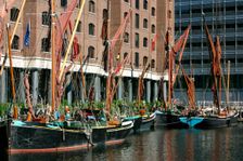 Sailing barges in St Katherine's Dock, London. Creator: Peter Thompson