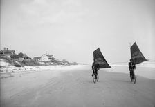 Sailing bicycles on the beach, Ormond, Fla., between 1900 and 1910. Creator: Unknown