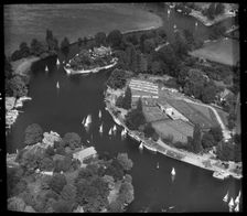 Sailing boats on the River Thames and Weybridge Tennis Club, Weybridge, Surrey, 1959. Creator: Aerofilms