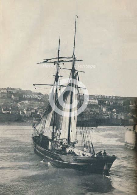 'Sailing Into Newlyn Harbour, the Isabella, a two-masted Lancashire type schooner', 1937 Artist: Unknown.