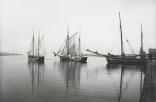Sailing ships leave the harbour of Landskrona in dead calm conditions, Sweden, 1903