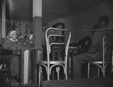 "Saints" in the congregation of the St. Martin's Spiritual Church, Washington, D.C., 1942. Creator: Gordon Parks