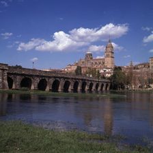Salamanca. View of the Roman bridge over the river Tormes with the cathedral in the background