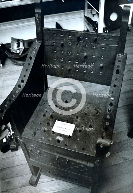 Sale of torture instrument at Sotheby's, London, 1968. Creator: Unknown.