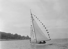 Saling yacht Asphodel (K5) with prize flags, 1922. Creator: Kirk & Sons of Cowes