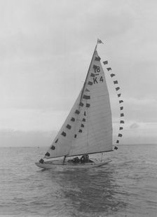 Saling yacht Asphodel (K5) with prize flags, 1922. Creator: Kirk & Sons of Cowes