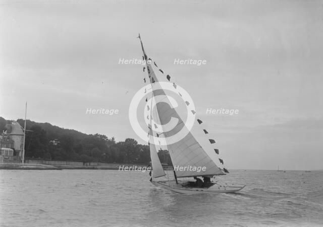 Saling yacht 'Asphodel' (K5) with prize flags, 1922. Creator: Kirk & Sons of Cowes.
