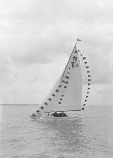 Saling yacht Asphodel (K5) with prize flags, 1922. Creator: Kirk & Sons of Cowes
