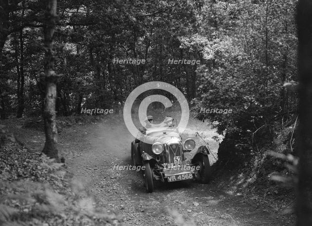 Salmson taking part in a motoring trial, c1930s. Artist: Bill Brunell.
